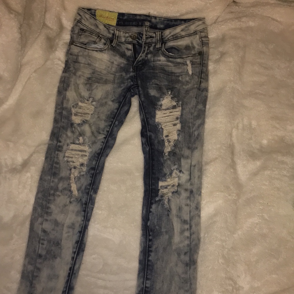 Machine Pour Neuf Mode acid-washed ripped jeans